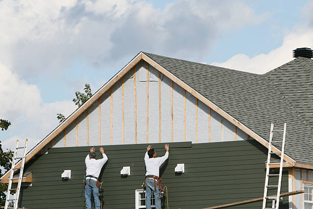 Professional Siding technician working in Fayetteville, NC